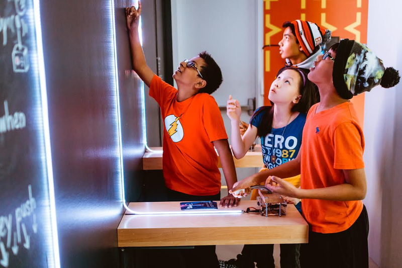 Kids playing at the TIFF Kids digiPlaySpace exhibition, Toronto, Canada, 2016